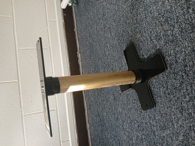 Cross-shaped foot with wooden pole and plastic mounts